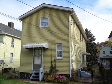 Exterior Back. Back of home.  Fenced-in level yard