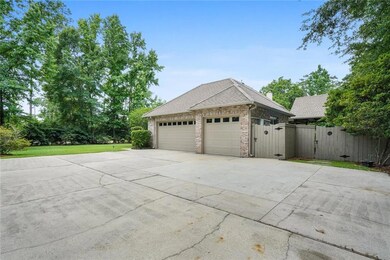 Three car garage and plenty of parking space