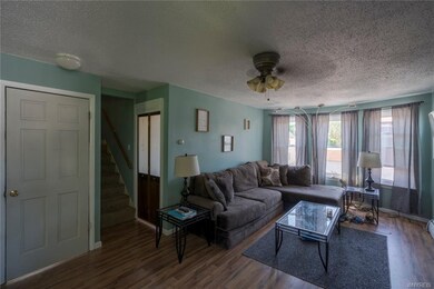 Upstairs living room with newer laminate flooring 
