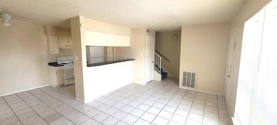 Kitchen with electric stove, freestanding refrige