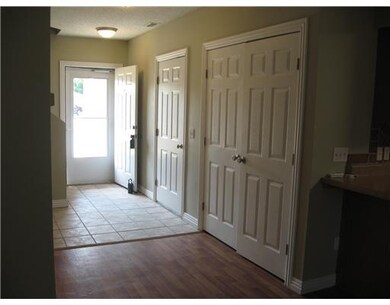 Interior Space/Layout. Nice wide foyer. 4 doors access: garage, laundry closet, half bath, understair storage.