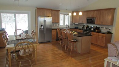 Spacious living area with fully appliance kitchen slider to deck, dining and living areas. 21 ft by 28ft.