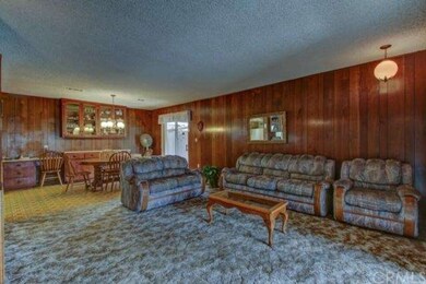 The family room at 16428 Gard Avenue is right next