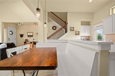 Dining area featuring stairway and recessed light