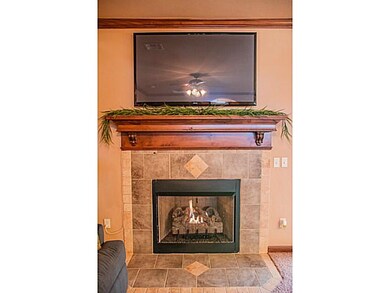 Living Room. Lovely fireplace with gas logs.