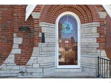 Awesome arched brick work above the original front door.