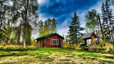 Quaint Cabin by the River
