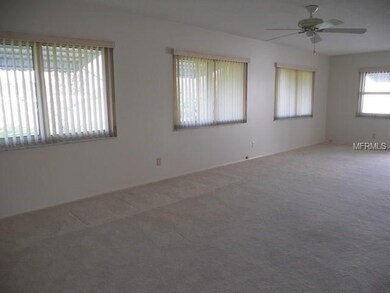 Freshly painted large open family room with view o