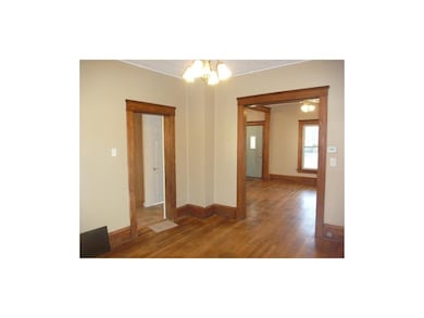 Dining Area. Beautiful hardwood floors and origina