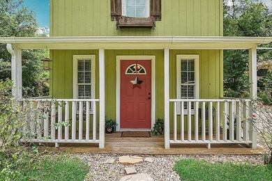 A lovely front porch to sit at and relax at the end of the day.