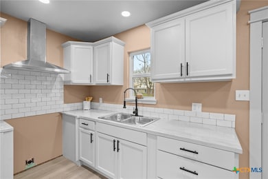 With new cabinets, modern fixtures, and a stylish
