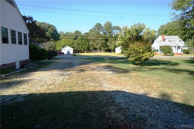 Plenty of parking on a beautiful lot near other well-maintained homes.
