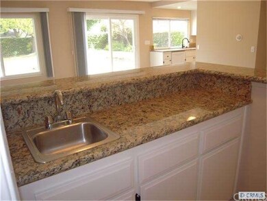 WALK-BEHIND WETBAR W/GRANITE COUNTERS