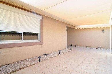 Concho covered front patio