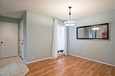 Bright and open condo tiled entry with expansive l