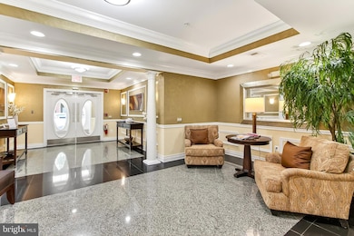 7880 Rolling Woods Ct unit 104, Springfield, VA 22152 - photo 3