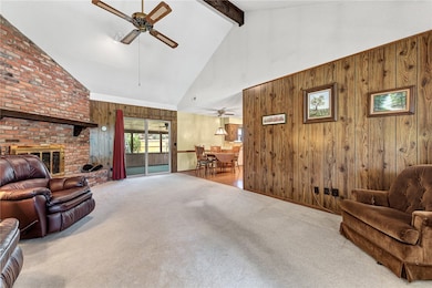 Family Room features beautiful paneling.