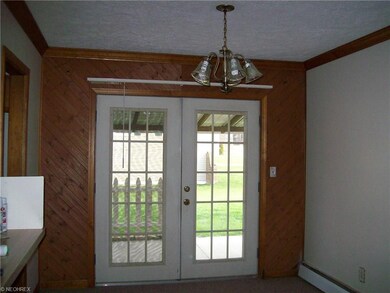 French Doors leading out to patio of main house. K