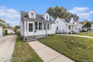 Cape cod home featuring a shingled roof and entry steps