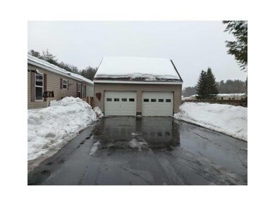 Exterior Front. The detached garage...