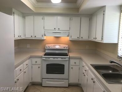 kitchen with tray ceiling