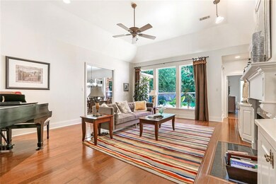 Spacious living room with built in shelving and fi