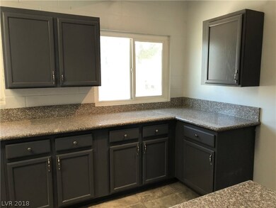 Lots of kitchen cabinets for storage.