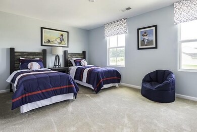 Upstairs you'll find 3 large size bedrooms.  *This is a model photo