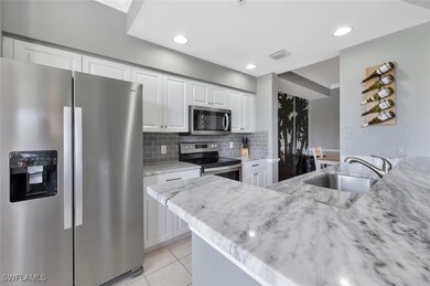Kitchen with appliances with stainless steel finis