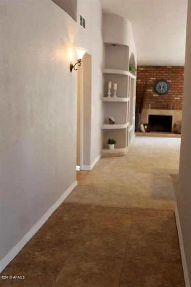 HALL TO FAMILY ROOM + KITCHEN