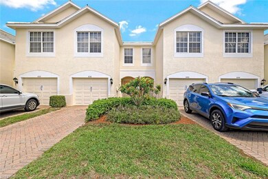 Townhome / multi-family property with a garage and