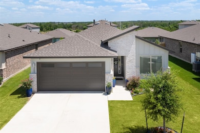 View of front of home featuring board and batten 