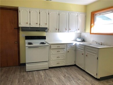 Freshly painted kitchen with NEW flooring