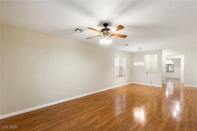 Spare room with light wood-style floors, baseboard