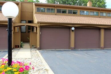 Oversized 2 -car garage with built-in shelving. Fu