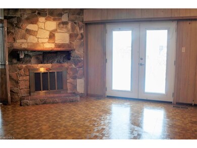 Family Rm with French doors to patio and gas firep