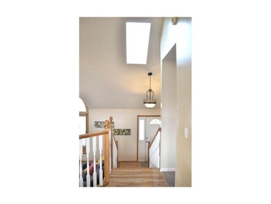 Vaulted entry with skylight