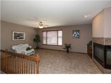 Living room with 3 sided gas fireplace