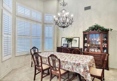 Formal dining room with beautiful chandelier