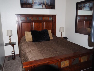 Beautiful queen bed with flat screen TV

