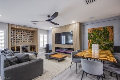 The living room showcases plantation shutters, sur