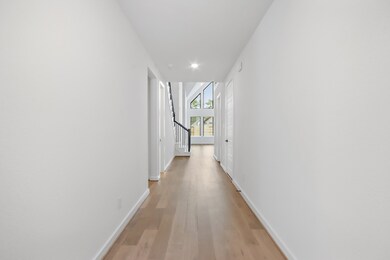 Wide Entrace with view of stair well.