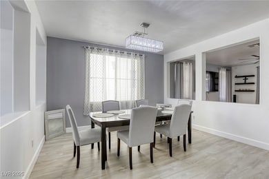 Dining space featuring light wood-style flooring a