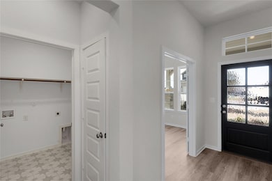 Entrance foyer with plenty of natural light and l