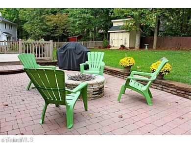 Patio/Deck. Relax on the patio and enjoy the beautiful fenced yard.  Great storage building in the back yard too.