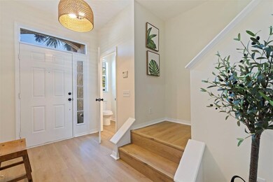 Entrance with half bathroom