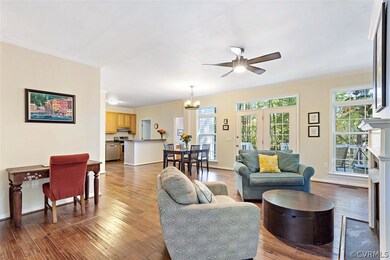 Gorgeous family room, dining area and kitchen! Great desk space and notice the transom windows across the back!