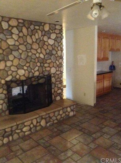 duel fireplace to living area and dining family ar