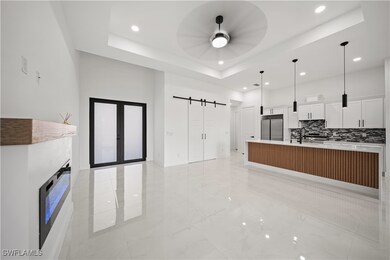 Kitchen featuring stainless steel built in fridge,