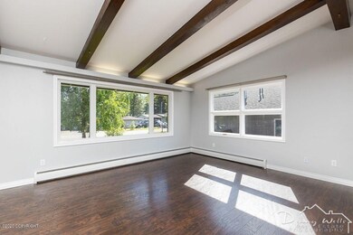 1111 W. 53rd Ave.- Living Room With Vaul